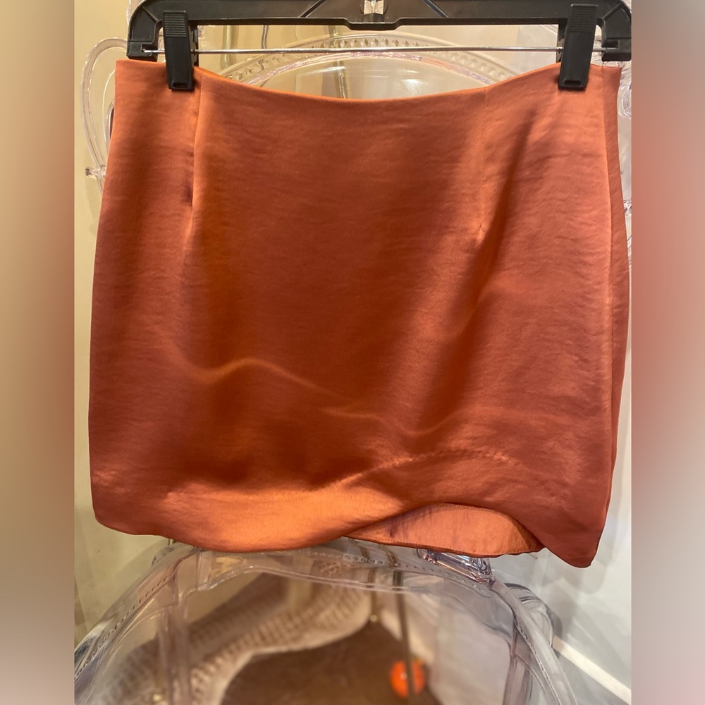 Soft terra cotta colored silk mini skirt. NWT